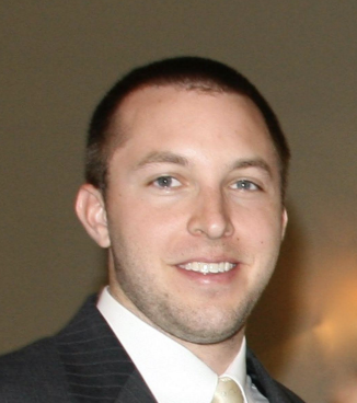 Photo of Trent Wilson smiling.